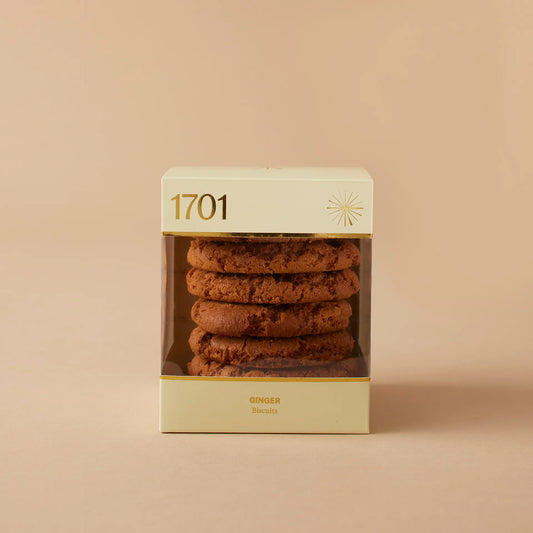 A 200g box of handmade ginger biscuits, SANHA Halaal approved, with a product label visible on the front of the box.
